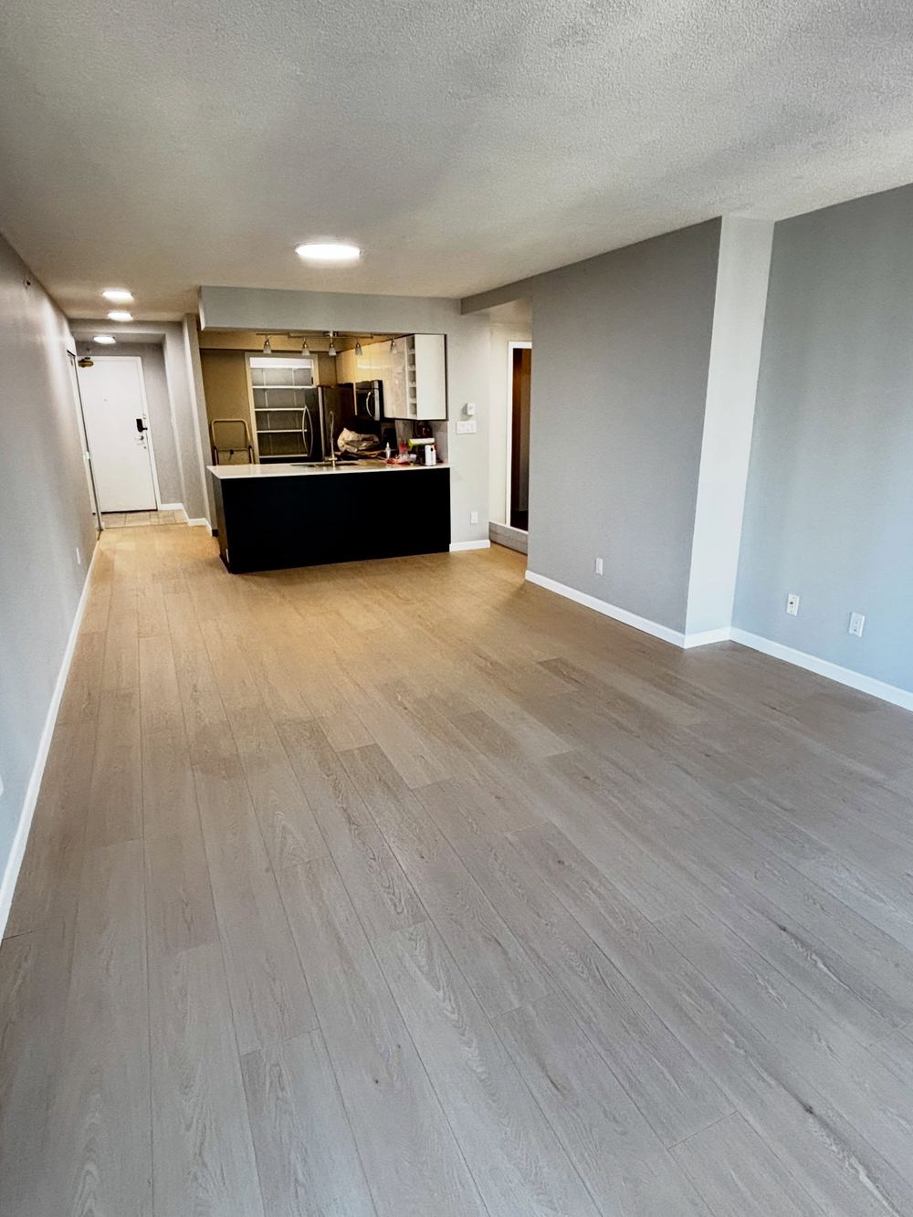 Downtown Vancouver condo with new flooring and fresh paint