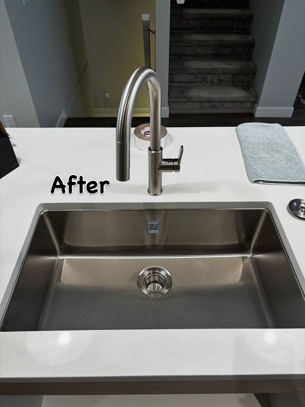 After: single-bowl undermount sink and new faucet
