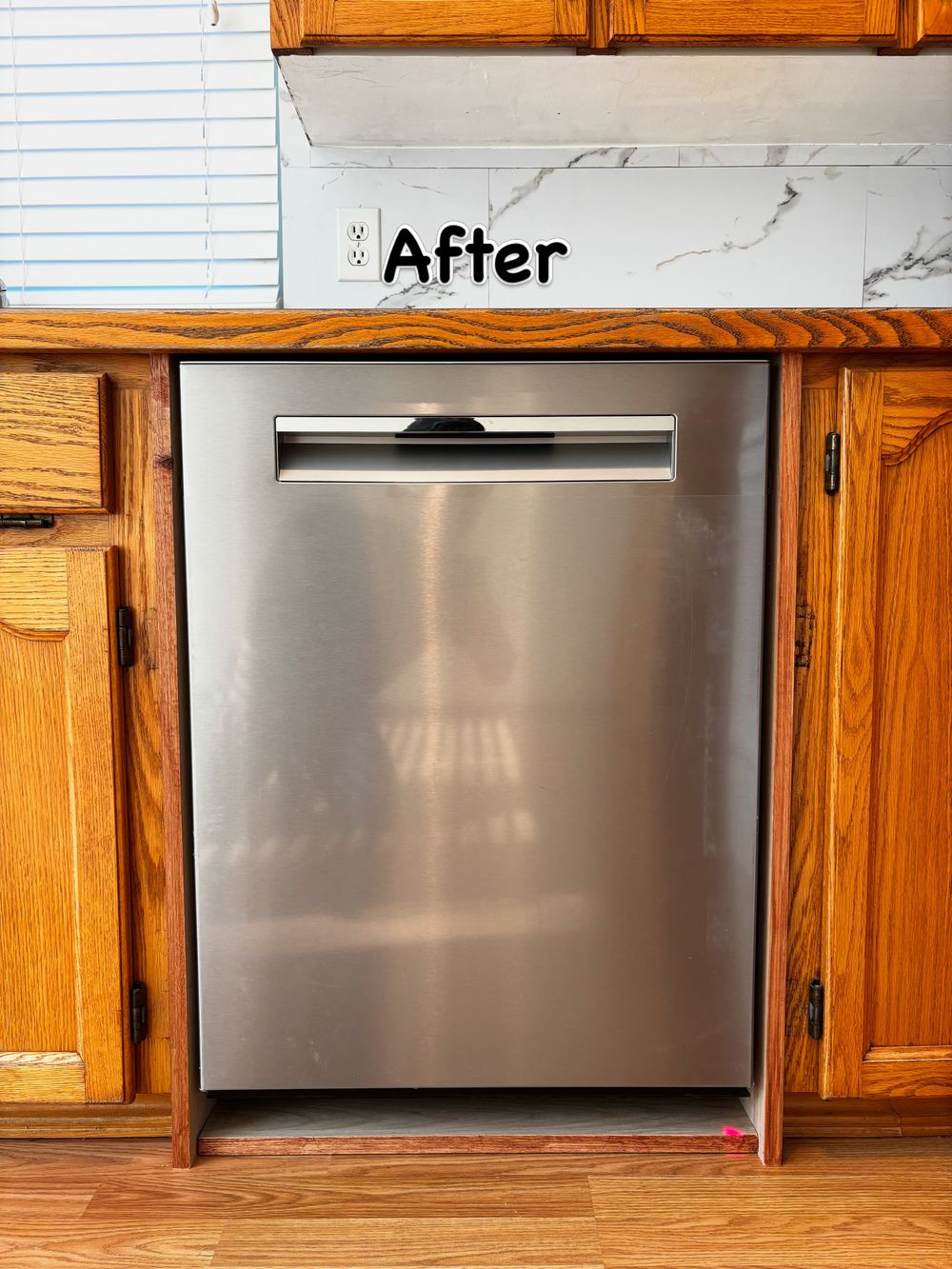 Kitchen after: new dishwasher fitted and trimmed in oak